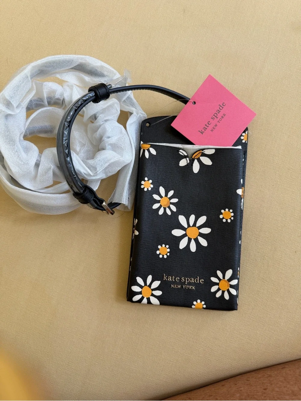 kate spade Black Daisy Phone Pouch with Yellow Centers
